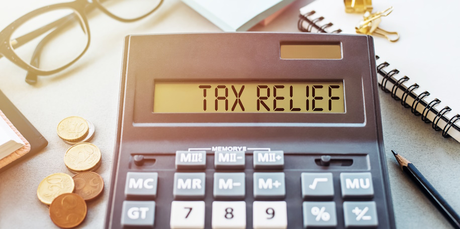 calculator that says tax relief on a table
