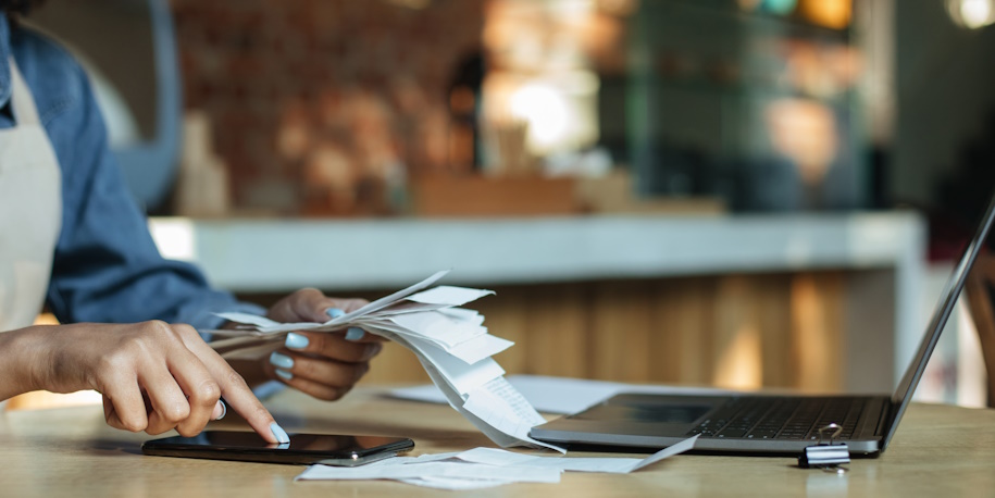 small business owner reviewing debt
